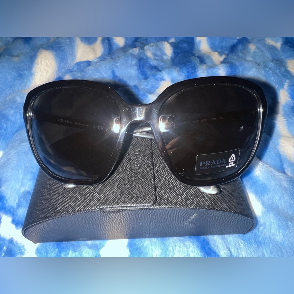 Brand new, prada sunglasses. Never worn.